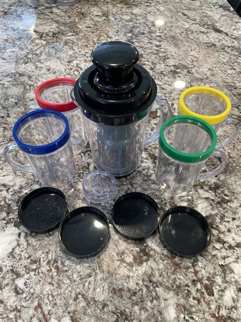 Magic bullet storage cups with lids